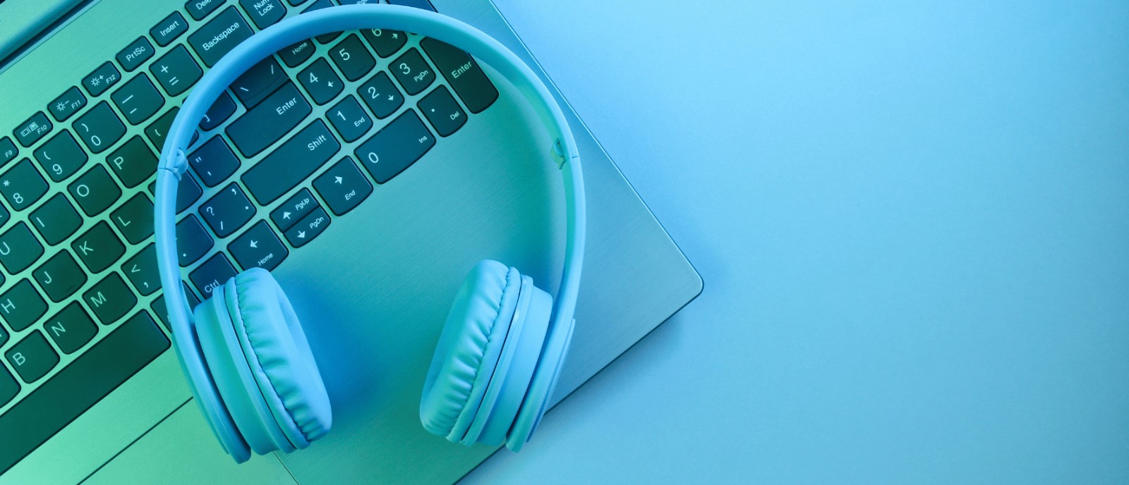 Are You Using Headphones Safely? | Aanvii Hearing Person wearing headphones carefully to protect their ears — Aanvii Hearing.